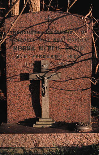 stone with metal crucafix